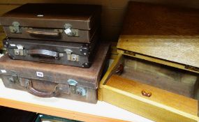 Three vintage suitcase together with wooden table top clerks desk Condition reports provided on