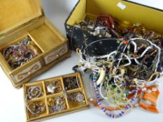 A wooden jewellery box containing costume jewellery, necklaces, bangles, brooches ETC Condition