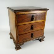 A miniature apprentice-style three-drawer chest Condition reports provided on request by email for