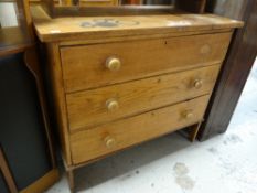 A lightwood vintage chest of three long drawers and a vintage open bookcase Condition reports
