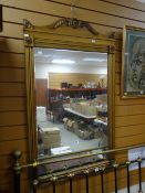 A gilt framed bevelled wall mirror, 125cms high Condition reports provided on request by email for
