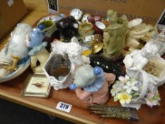 A tray of mixed small collectables including soapstone, reproduction patch-boxes, Nao clown,