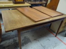 A mid-century G-Plan dining table extending with a pair of end leaves, 153 x 89cms (non extended)