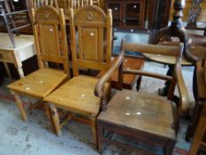 An antique farmhouse elbow chair and a pair of pine chairs with carved lunette backs Condition