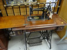 A vintage Singer treadle sewing machine table Condition reports provided on request by email for