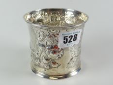 A Newcastle silver hunting cup, circa 1760, decorated in repousse with two hounds in pursuit of a