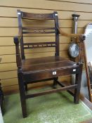 A nineteenth century elm farmhouse chair with bobbin back and carved rail Condition reports provided