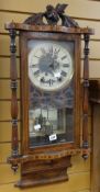 A mahogany inlaid and cross-banded Vienna wall clock (distressed) Condition reports provided on