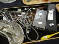 A parcel of doctors examining utensils including stethoscope, scissors, kidney shaped bowl