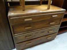 A vintage chest of four long drawers with wooden handles, 90cms wide Condition reports provided on
