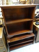 A mahogany two-shelf open bookcase on bracket feet, 78cms wide and a modern rosewood TV cabinet