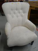 A modern button back armchair Condition reports provided on request by email for this auction
