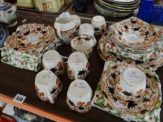 Tray of Victorian blue, orange and gilt floral decorated teaware Condition reports provided on