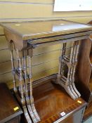 A reproduction nest of three coffee tables Condition reports provided on request by email for this