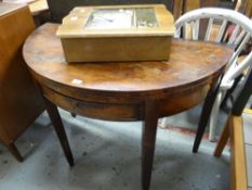 An antique mahogany half-moon foldover baize lined card table with drawer Condition reports provided