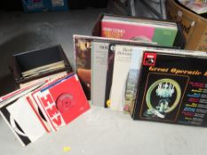 Quantity of vinyl records in two cases Condition reports provided on request by email for this