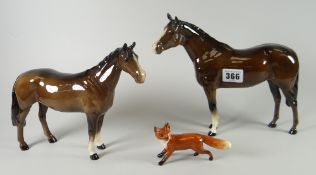 Two Beswick standing brown horses with white front socks and a Beswick fox Condition reports