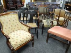 A parcel of chairs comprising a vintage mahogany elbow chair with floral tapestry cushion and back