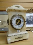 A marble antique mantel clock of architectural form with skeleton dial (distressed) Condition