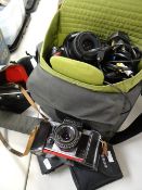 A cased vintage Praktica Super TL camera and later camera equipment Condition reports provided on