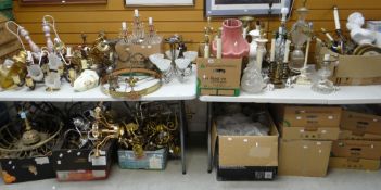 A very large quantity of mixed lighting and accessories including chandeliers, table lamps, shades
