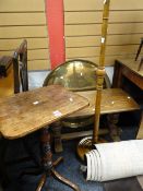 A rounded rectangular top occasional table on turned and spider supports, a mahogany standard lamp &