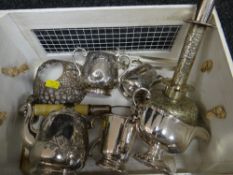 Box of silver plate items including Bachelor's teaset, candle lamp, tankard, sauce jug and tea tongs