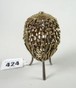An unusual Queen Elizabeth II London silver-gilt filigree casket in the form of an egg on stand,