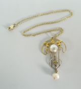 An antique 9ct yellow gold brooch and fine necklace, the brooch of floral form and centred with