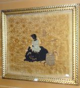 A nineteenth century Chinese silk and fabric panel depiction of a boy playing a flute while