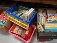 A quantity of mixed books in various tubs and including rugby reference books, mid-century