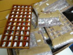 Large quantity of assorted mainly china thimbles, many in wooden display cases, some loose Condition