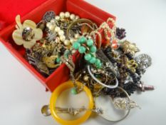 A red jewellery box and mixed costume jewellery contents Condition reports provided on request by