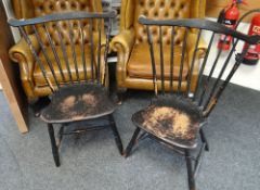 A pair of turn of the century folk-art vernacular American fan-backed Windsor-type chairs, stained