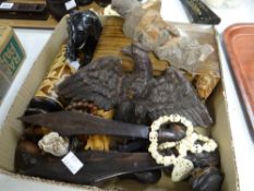 A tray of carved items and treen, bone necklace, beads ETC Condition reports provided on request