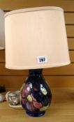 A blue ground Moorcroft floral table lamp & shade Condition reports provided on request by email for