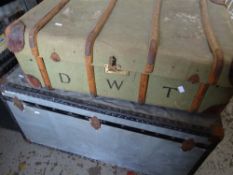 A canvas covered and wooden banded cabin trunk and a mid-century vintage cargo case Condition