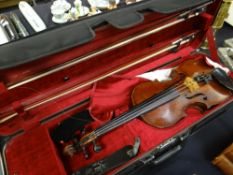 A 18th century violin of dark chestnut colour and bearing internal label for Thomas Smith,