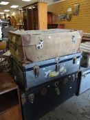 Two mid-century hard lined cabin cargo trunks & an earlier canvas lined vintage cabin trunk