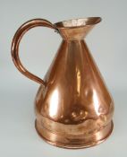 An antique copper 2 gallon measuring jug bearing label to neck, inscribed 'V R Loftus Ltd,