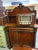 Large raised back sideboard with moulded surround and shelf on bobbin supports and with drawer and