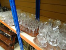 Four trays of assorted drinking glasses to include Bohemia Czechoslovakian, foliate etched, thumb