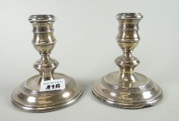 Pair of silver dwarf candlesticks, London hallmarks (loaded) Condition reports provided on request