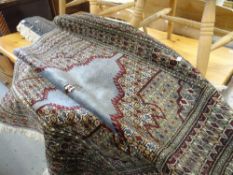 Two intricately patterned Persian rugs with fringe ends, 187 x 121cms & 183 x 123cms Condition
