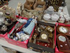 Four boxes of clocks including an inlaid mahogany example for repair, a carved framed barometer