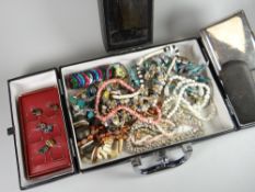 A modern leather jewellery box with centre internal mirror and contents of beads, vintage spectacles