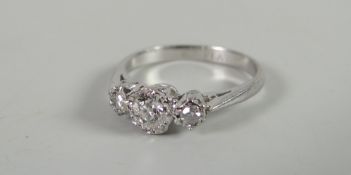 Platinum 18ct three-stone diamond ring Condition reports provided on request by email for this