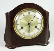 A mid-century Bakelite Smiths mantel clock Condition reports provided on request by email for this