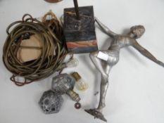 An Art Deco period cast metal female dancer in period skimpy dancing skirt and with two-tone