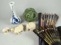 A small Chinese porcelain underglaze-blue floral decorated chimney vase bearing character marks to